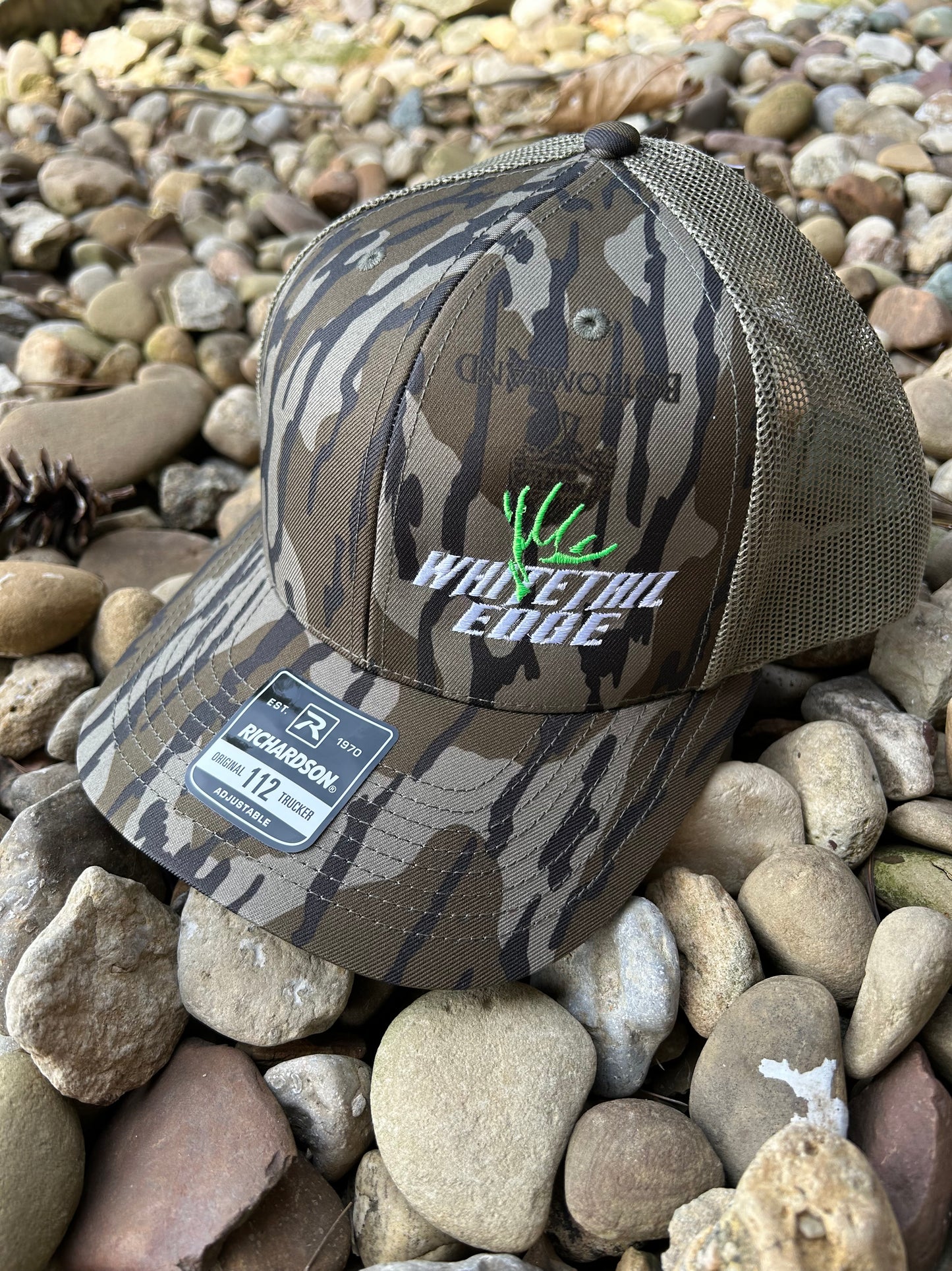Mossy Oak Bottomland snap back Trucker hat with Whitetail Edge Green antler logo