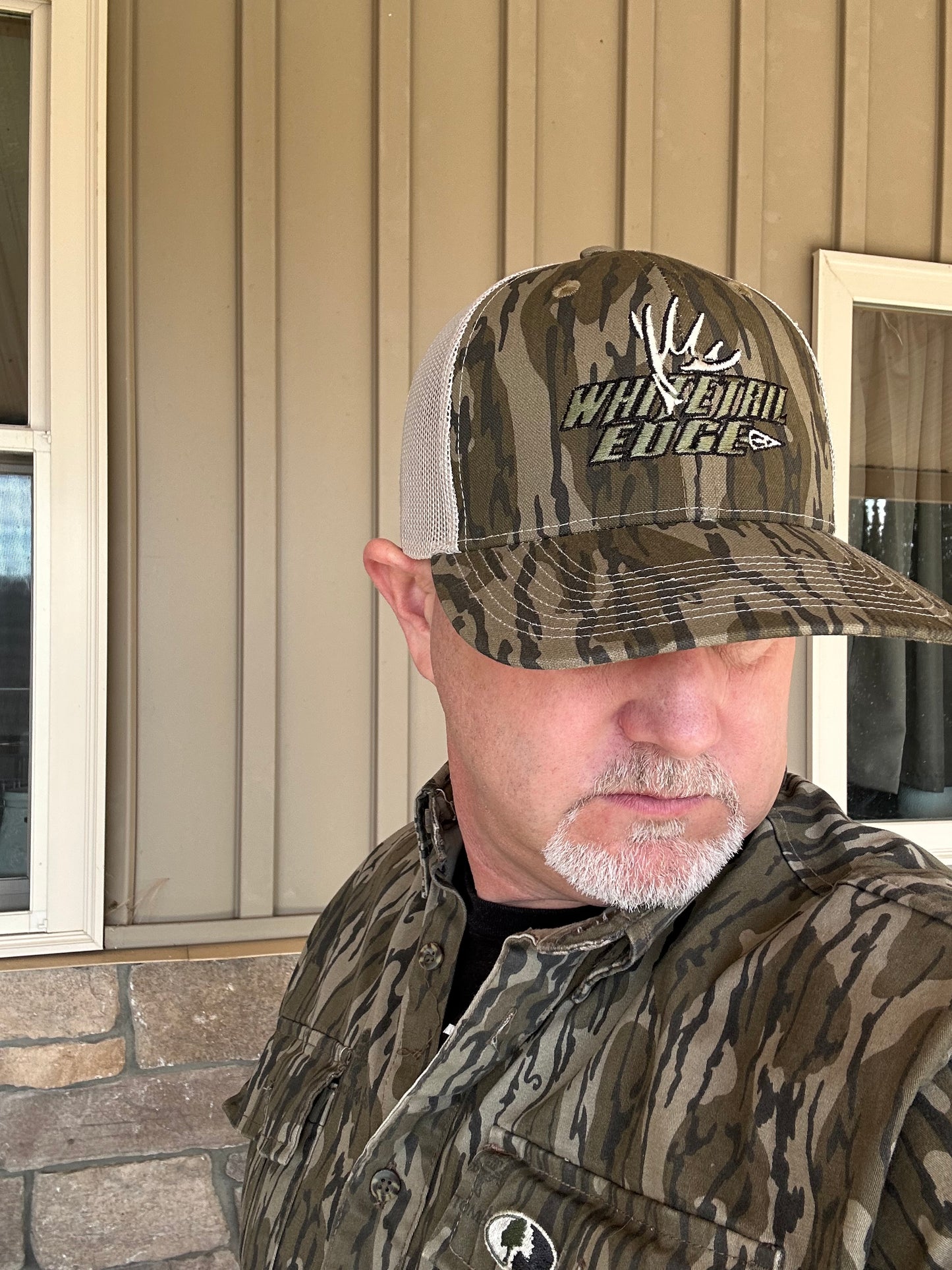 Mossy oak Bottomland/tan with darker logo