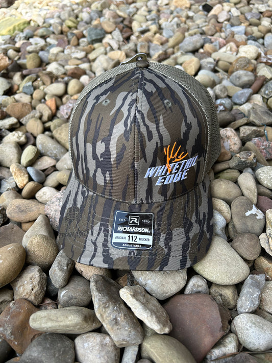 Mossy Oak Bottomland snap back Trucker hat with Whitetail Edge Orange antler logo