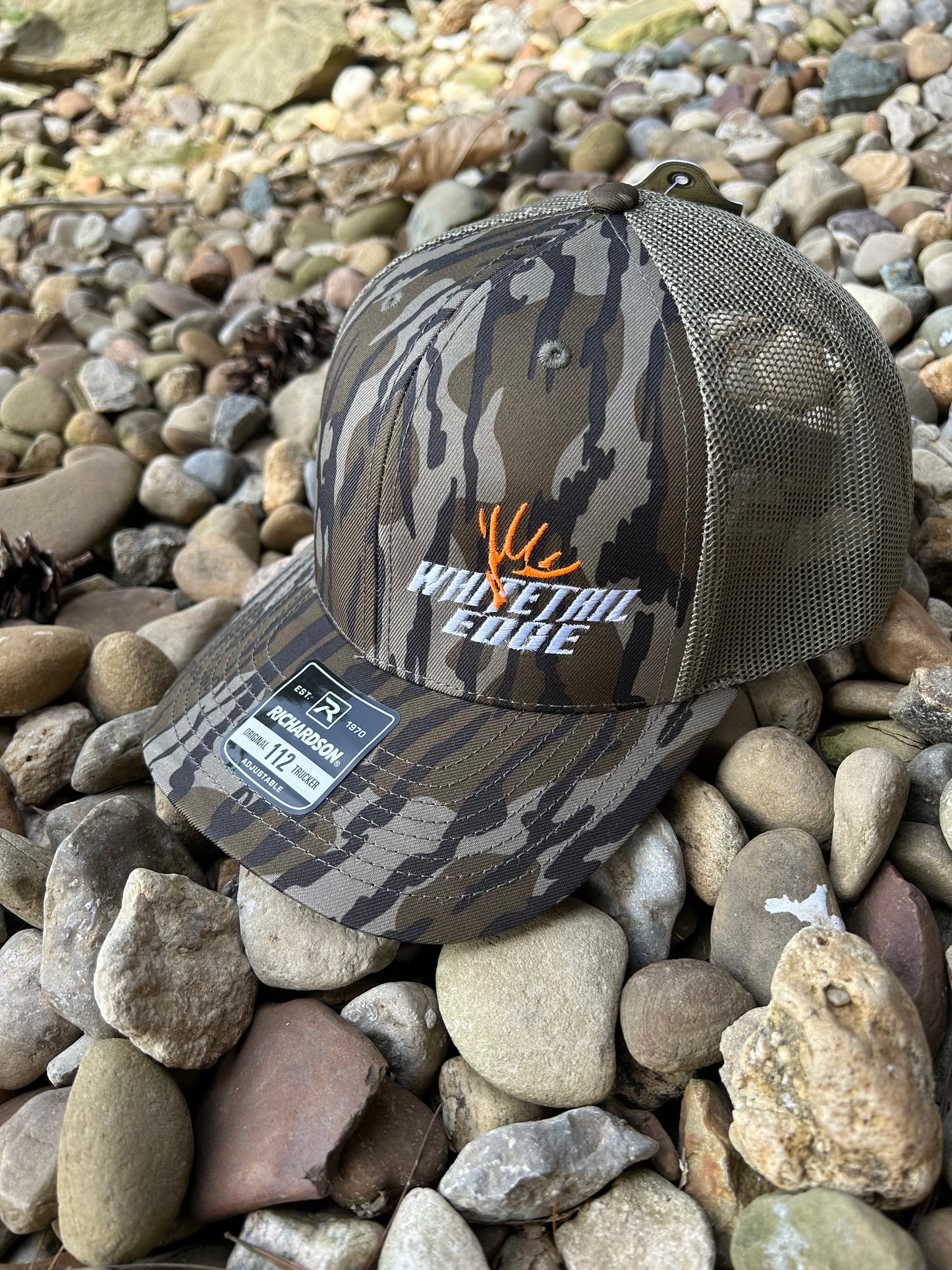 Mossy Oak Bottomland snap back Trucker hat with Whitetail Edge Orange antler logo